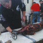 Cooked pig on a spit